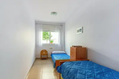 Cama o camas de una habitación en Elegant Apartment in Lloret de Mar, 85 m² with Pool