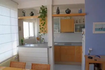 Una cocina o zona de cocina en BRAVAHOLIDAYS-121-Canastell-58
