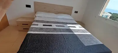 Cama o camas de una habitación en BRAVAHOLIDAYS-250-Poblet