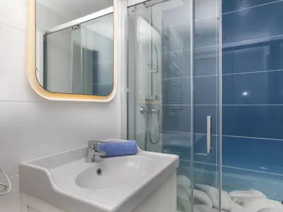 Un baño de Apartment Cala Salionc by Interhome