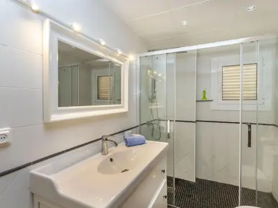 Un baño de Apartment Cala Salionc by Interhome