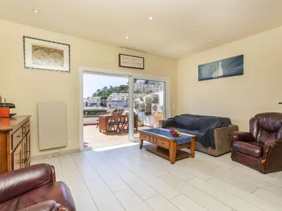 Zona de estar de Apartment Cala Salionc by Interhome