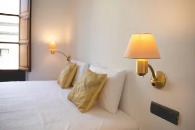 Cama o camas de una habitación en Bravissimo Mercaders 6