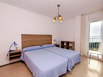 Cama o camas de una habitación en Apartment Paisos Catalans by Interhome