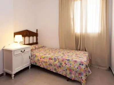 Cama o camas de una habitación en Apartment Paisos Catalans by Interhome