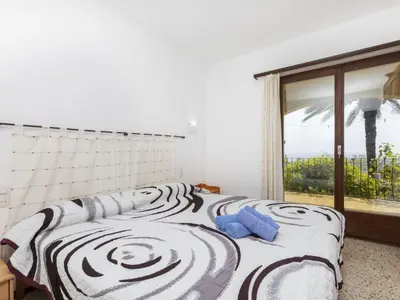Cama o camas de una habitación en Holiday Home Puig Romani-2 by Interhome