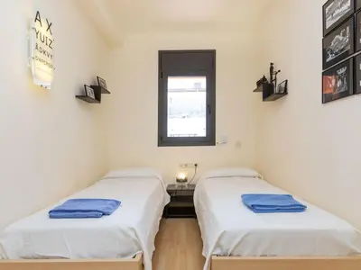 Cama o camas de una habitación en Apartment Jardins Sa Boadella by Interhome