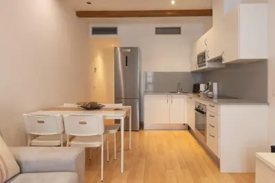 Una cocina o zona de cocina en Bravissimo Plaça dels Raïms