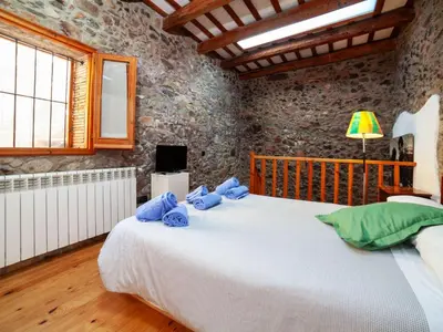 Cama o camas de una habitación en Holiday Home Sant Joan by Interhome