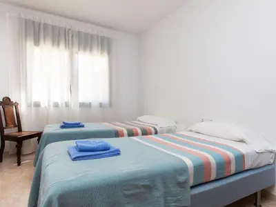 Cama o camas de una habitación en Holiday Home Mas Pere by Interhome