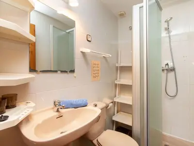 Un baño de Holiday Home Club by Interhome