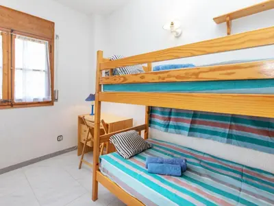 Cama o camas de una habitación en Holiday Home Club by Interhome