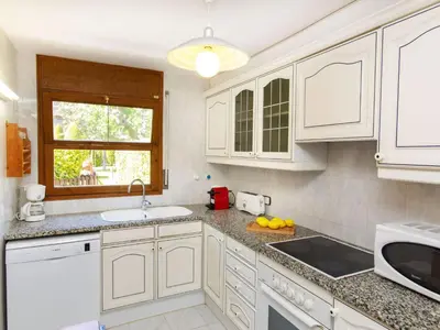 Una cocina o zona de cocina en Holiday Home Club by Interhome