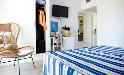 Cama o camas de una habitación en ALEGRIA Sun Village