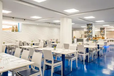 Un restaurante o sitio para comer en ALEGRIA Sun Village