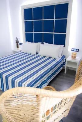 Cama o camas de una habitación en ALEGRIA Sun Village