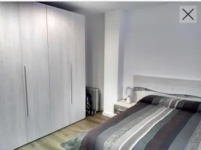 Cama o camas de una habitación en Apartamento totalmente reformado en 1ª linea