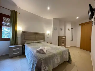 Cama o camas de una habitación en P&R hostals Codolar