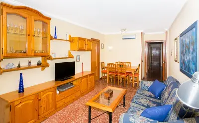 Una televisión o centro de entretenimiento en HomeHolidaysRentals Keyla