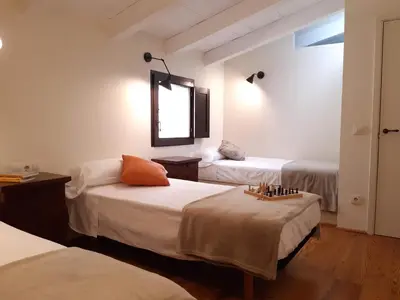 Cama o camas de una habitación en MONELLS - CASA Rural - CAN FELIP