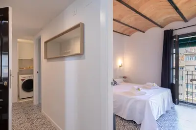 Cama o camas de una habitación en Flateli Rambla 5 3-1