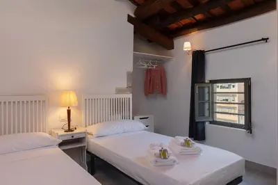 Cama o camas de una habitación en Flalteli Rambla 5 4-1
