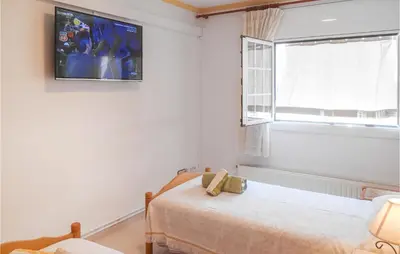 Cama o camas de una habitación en Pet Friendly Apartment In Tossa De Mar