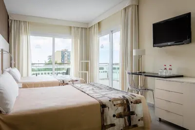 Cama o camas de una habitación en ALEGRIA Caprici Verd 4 SUP
