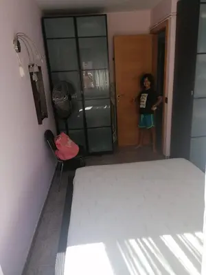 Cama o camas de una habitación en APARTAMENTO CON WIFI Y PISCINA EN BLANES FRENTE A LA PLAYA - Costa Brava
