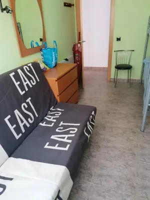 Cama o camas de una habitación en APARTAMENTO CON WIFI Y PISCINA EN BLANES FRENTE A LA PLAYA - Costa Brava