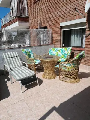 Un balcón o terraza de APARTAMENTO CON WIFI Y PISCINA EN BLANES FRENTE A LA PLAYA - Costa Brava