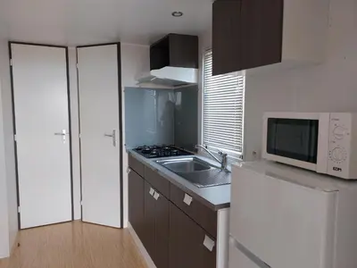 Una cocina o zona de cocina en El Carlitos