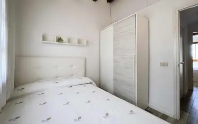Cama o camas de una habitación en Casa Blanca 34 – Piscina y Playa Privada Wifi