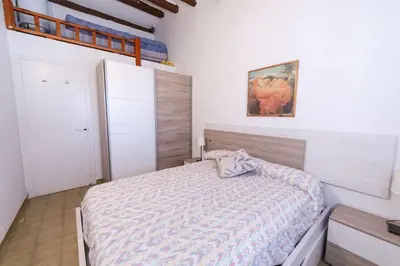 Cama o camas de una habitación en Casa Blanca 34 – Piscina y Playa Privada Wifi