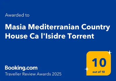 Certificado, premio, señal o documento que está expuesto en Masia Mediterranian Country House Ca l'Isidre Torrent