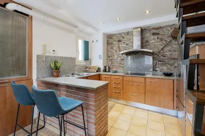 Una cocina o zona de cocina en Apartamento dúplex en el Barri Vell, Girona