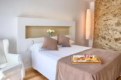 Cama o camas de una habitación en Hostalet de Begur - Adults Only