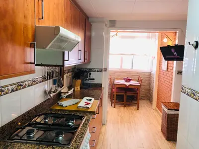 Una cocina o zona de cocina en Apartamento con terraza y piscina en Malgrat de Mar
