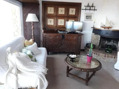 Una cocina o zona de cocina en Villa Transatlantique en première ligne de mer dite Villa Esmeralda