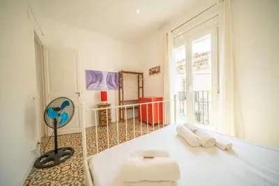 Cama o camas de una habitación en HomeHolidaysRentals Arlene