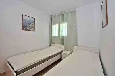 Cama o camas de una habitación en Apartment Tango