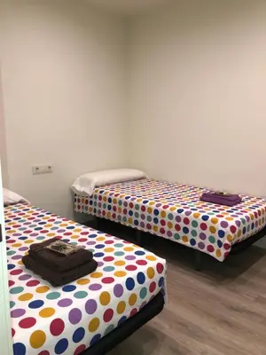 Cama o camas de una habitación en Calella Playa Vistas Mar