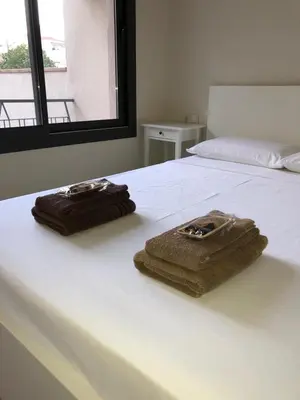 Cama o camas de una habitación en Calella Playa Vistas Mar
