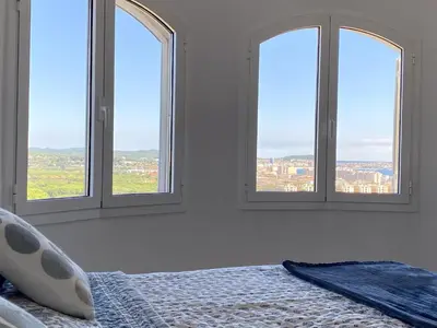 Cama o camas de una habitación en Villa Saramel con vistas panorámicas al mar