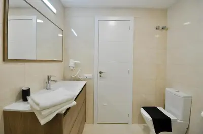 Un baño de Apartment Bellisimo