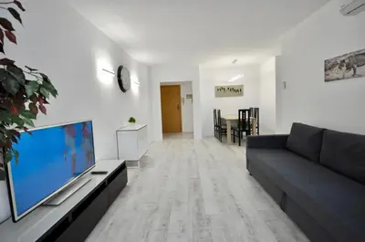 Una televisión o centro de entretenimiento en Apartment Bellisimo