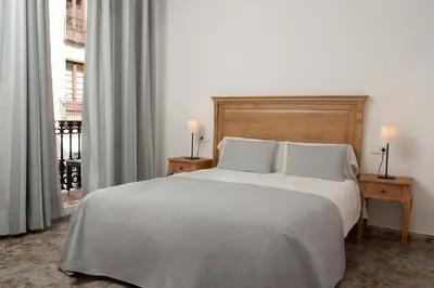 Cama o camas de una habitación en Hostal Portofino