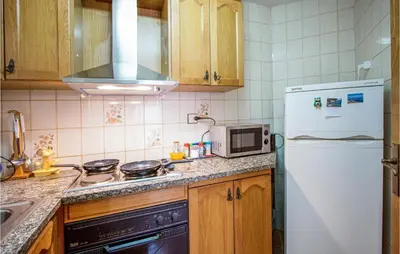 Una cocina o zona de cocina en Beach Front Apartment