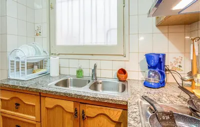 Una cocina o zona de cocina en Beach Front Apartment