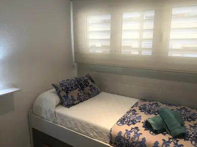 Cama o camas de una habitación en Apartamento Jaume II Palamós